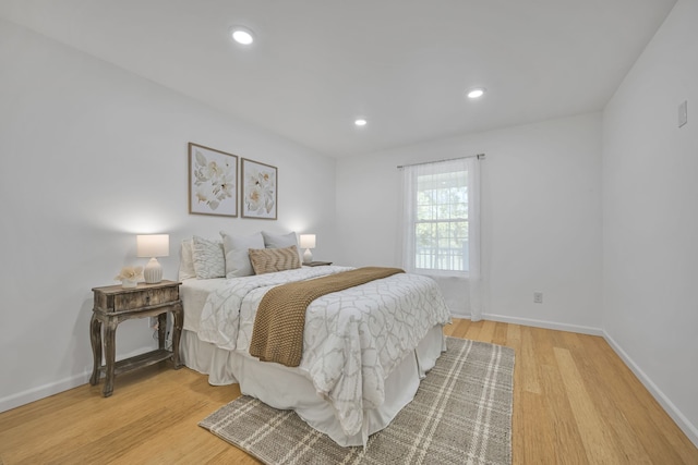 bedroom with wood-type flooring