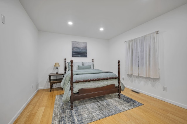 bedroom featuring wood-type flooring