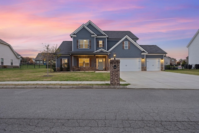 craftsman-style home featuring a yard