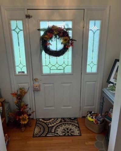 1159 New Hope Rd, Celina, TN 38551 - foyer featuring wood finished floors and plenty of natural light