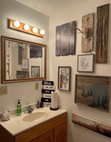 bathroom with vanity and a textured ceiling