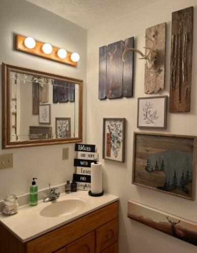 1159 New Hope Rd, Celina, TN 38551 - bathroom featuring vanity and a textured ceiling