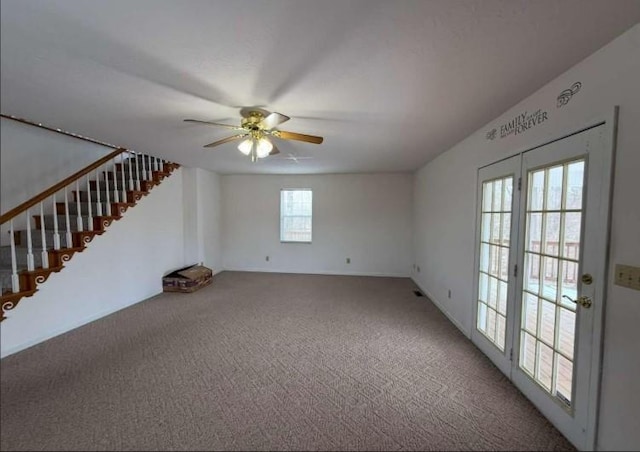 1159 New Hope Rd, Celina, TN 38551 - unfurnished living room with ceiling fan, stairway, and carpet floors