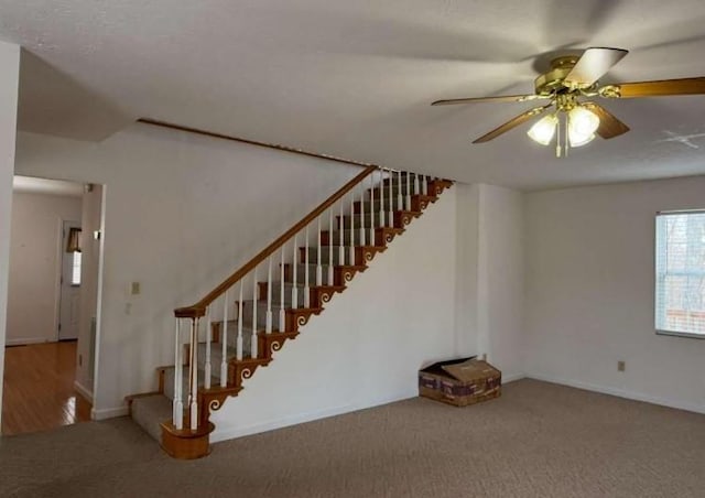 1159 New Hope Rd, Celina, TN 38551 - stairway with carpet flooring, ceiling fan, and baseboards