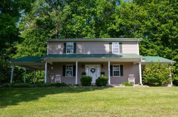 1159 New Hope Rd, Celina, TN 38551 - view of front of property featuring a front lawn and covered porch