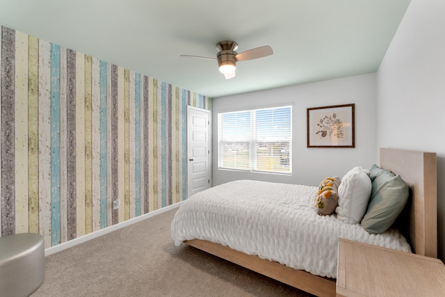 bedroom with ceiling fan and carpet