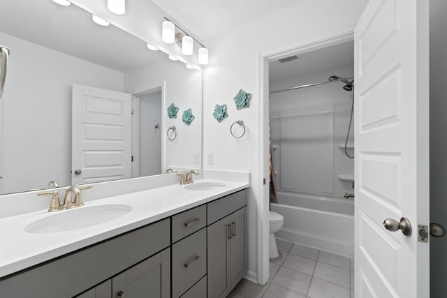 full bathroom with shower / bath combination, tile patterned floors, toilet, and vanity