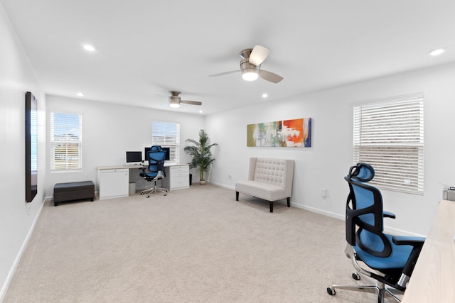 carpeted home office with ceiling fan