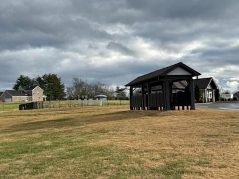 view of property's community with a lawn