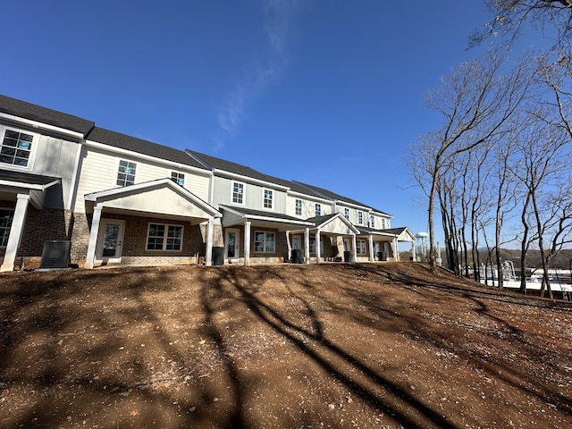 back of property with central AC unit