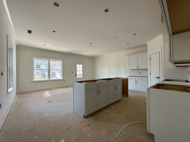 kitchen with white cabinets and a kitchen island