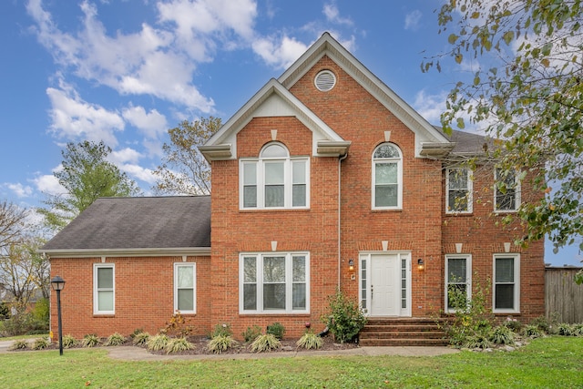 view of front of home featuring a front lawn