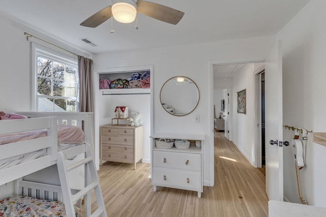 bedroom featuring ceiling fan and light wood-type flooring