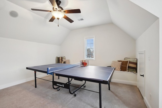 rec room with vaulted ceiling, light carpet, and ceiling fan