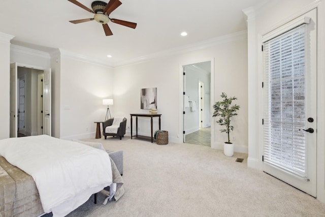 bedroom featuring crown molding, light colored carpet, and ceiling fan