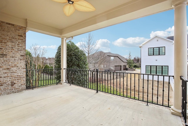 view of patio featuring ceiling fan