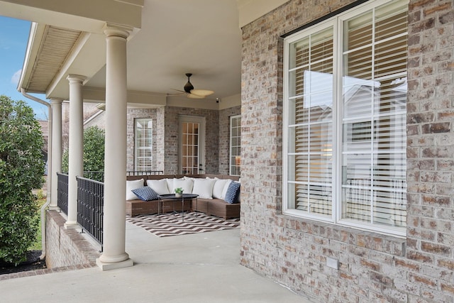 view of patio featuring an outdoor living space, a mail area, and ceiling fan