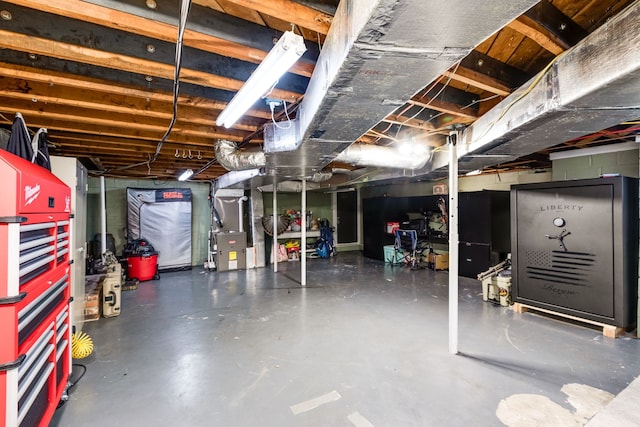 basement featuring heating unit