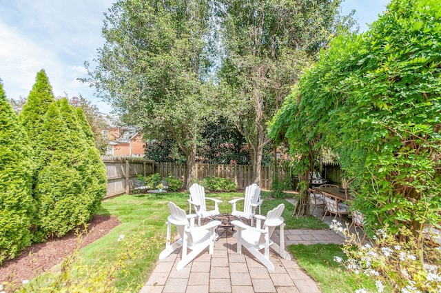 view of patio / terrace with an outdoor fire pit