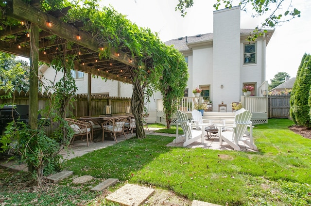 view of yard featuring a pergola and a patio area