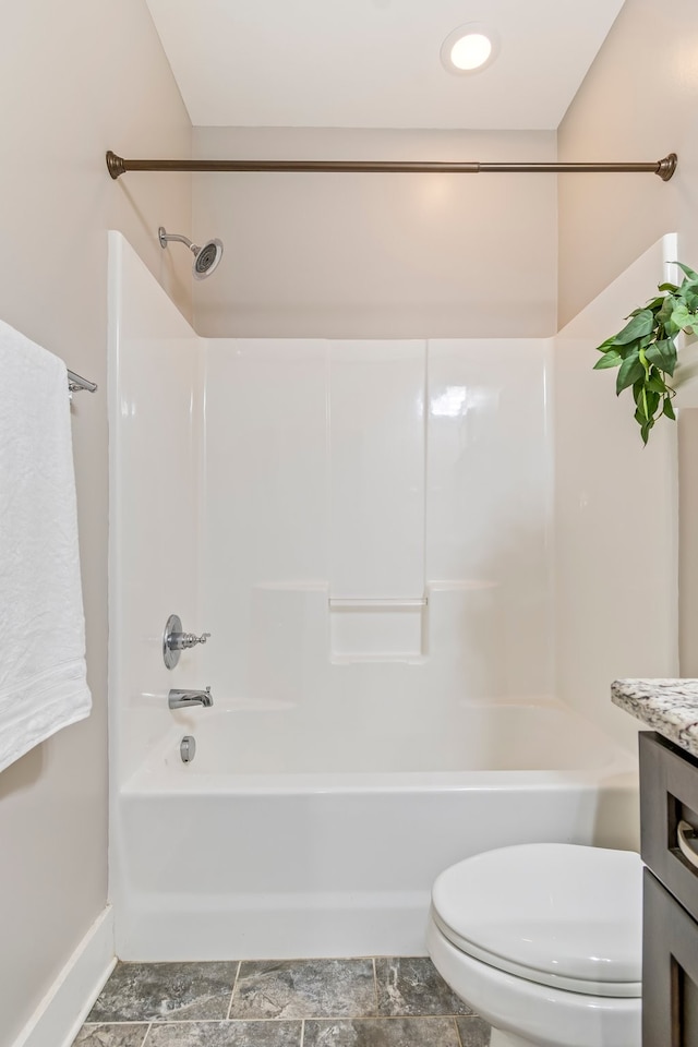 full bathroom featuring shower / washtub combination, vanity, and toilet