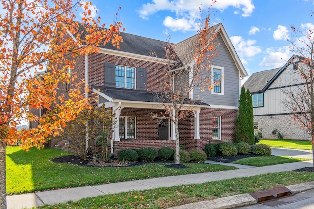 view of front of property with a front lawn