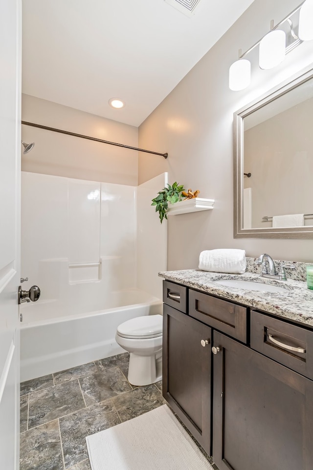 full bathroom with vanity, shower / bath combination, and toilet