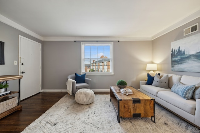 living room featuring crown molding and dark hardwood / wood-style flooring