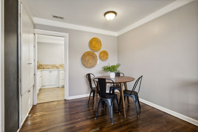 dining room featuring dark hardwood / wood-style floors