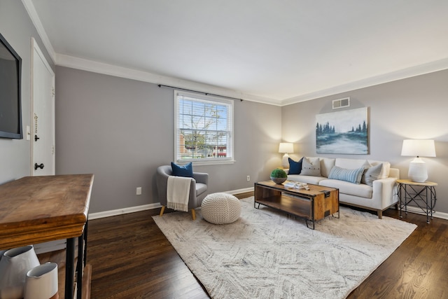 living room with dark hardwood / wood-style flooring and crown molding