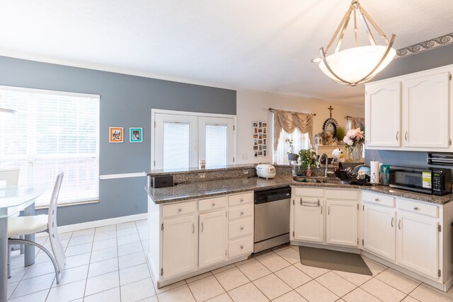 kitchen featuring kitchen peninsula, white cabinetry, stainless steel dishwasher, and a healthy amount of sunlight