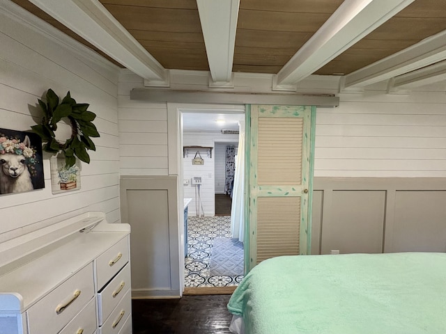 bedroom featuring wood ceiling and beamed ceiling