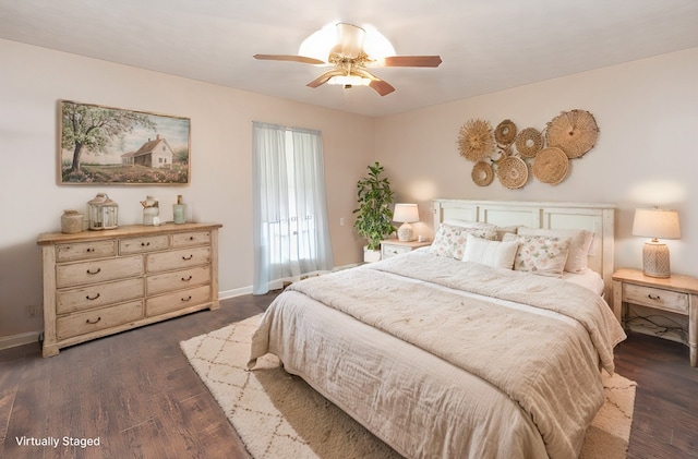 bedroom featuring ceiling fan and dark hardwood / wood-style flooring