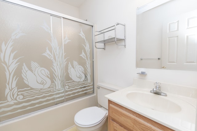 full bathroom with vanity, toilet, and bath / shower combo with glass door