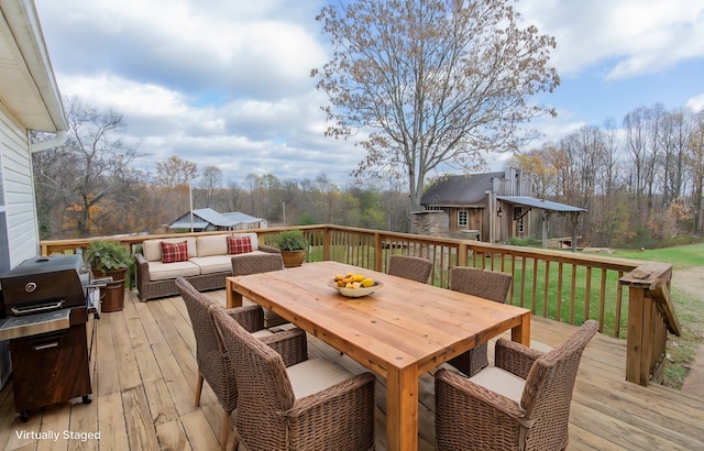 wooden terrace with a yard