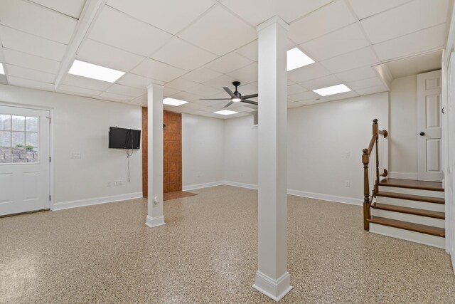 1055 Wades Branch Rd, Centerville, TN 37033 - below grade area featuring a paneled ceiling, a ceiling fan, baseboards, and stairway