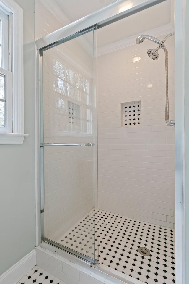 1055 Wades Branch Rd, Centerville, TN 37033 - bathroom with a shower stall, ornamental molding, and baseboards
