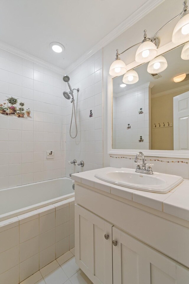1055 Wades Branch Rd, Centerville, TN 37033 - bathroom featuring crown molding, vanity, tiled shower / bath, and tile patterned floors