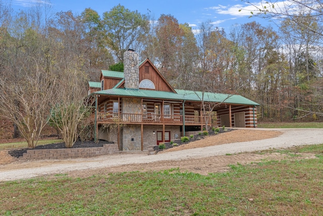 view of front of house featuring a wooden deck