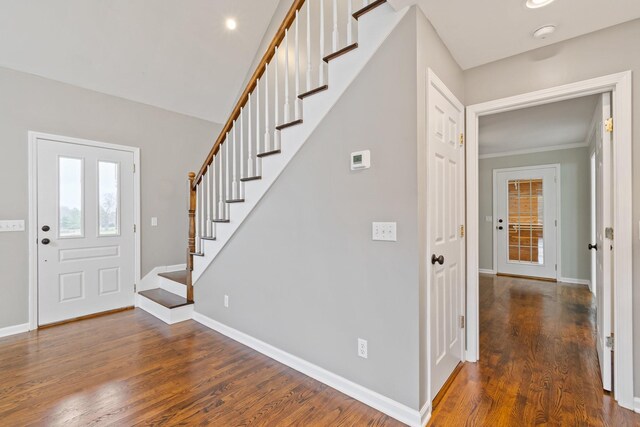 1055 Wades Branch Rd, Centerville, TN 37033 - entrance foyer featuring wood finished floors, healthy amount of natural light, stairway, baseboards, and ornamental molding