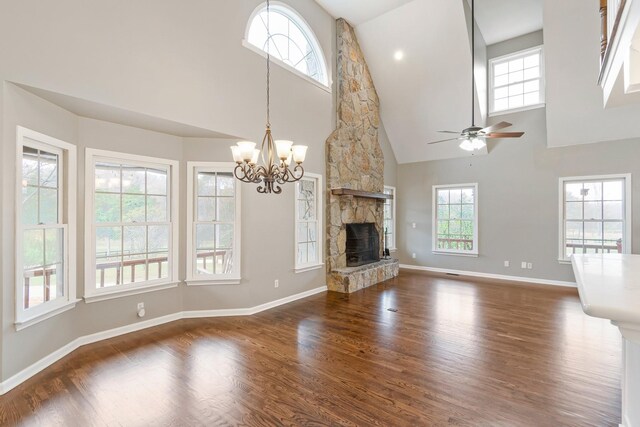 1055 Wades Branch Rd, Centerville, TN 37033 - unfurnished living room featuring high vaulted ceiling, plenty of natural light, a ceiling fan, and dark wood-style floors