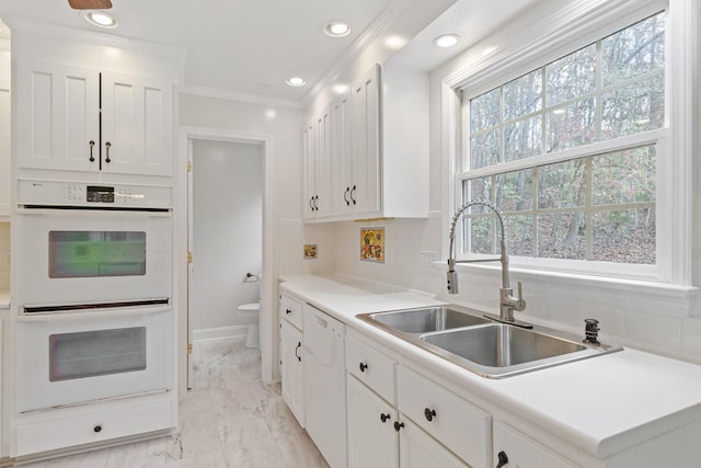 1055 Wades Branch Rd, Centerville, TN 37033 - kitchen featuring a sink, white appliances, white cabinetry, light marble finish floors, and recessed lighting