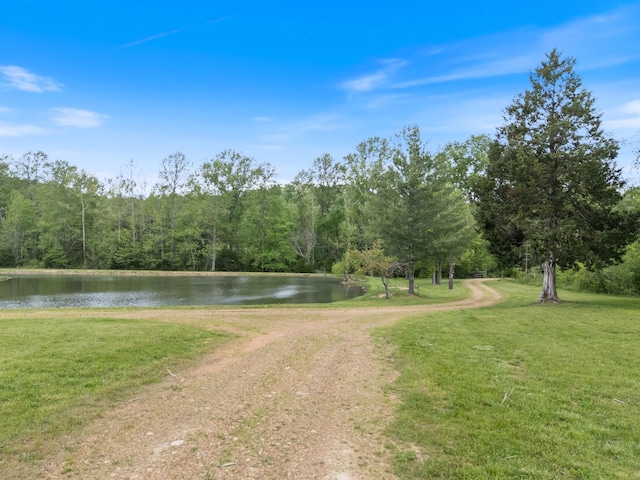 1055 Wades Branch Rd, Centerville, TN 37033 - view of home's community with a water view, a lawn, and a view of trees