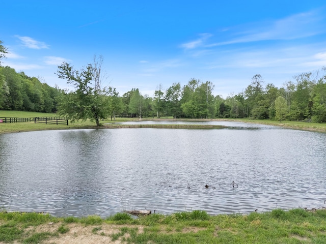 1055 Wades Branch Rd, Centerville, TN 37033 - water view featuring fence and a forest