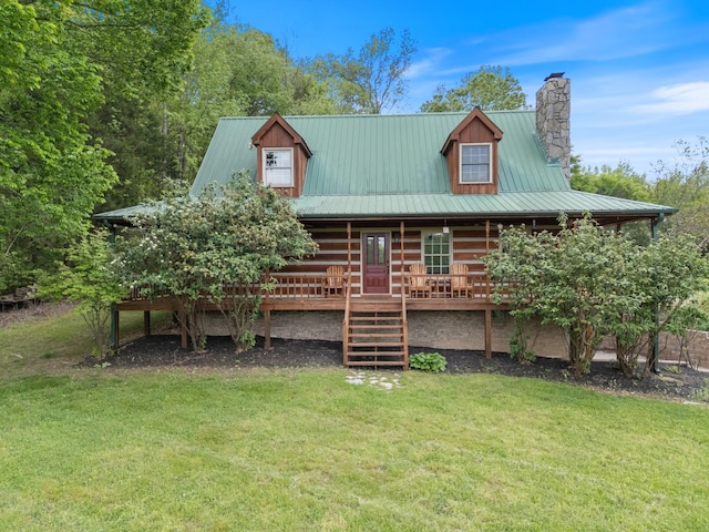 1055 Wades Branch Rd, Centerville, TN 37033 - back of property with a chimney, a lawn, and metal roof