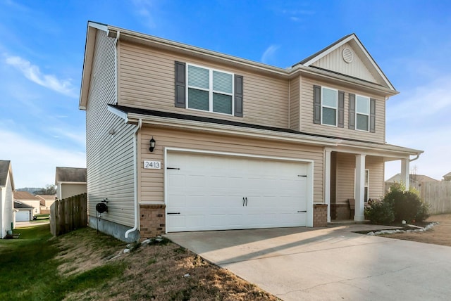 view of front of property featuring a garage