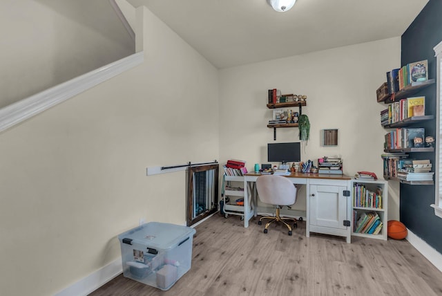 home office featuring light hardwood / wood-style floors