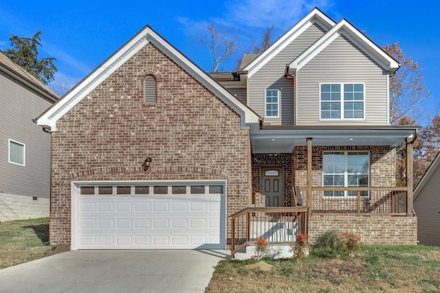 front facade with a garage and covered porch