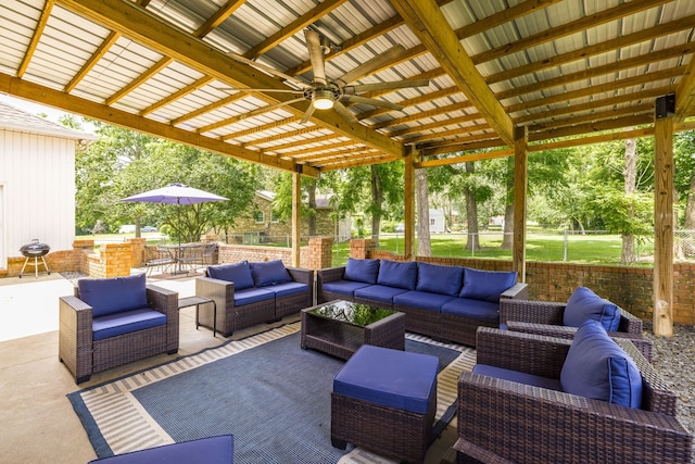 view of patio featuring a pergola and an outdoor living space