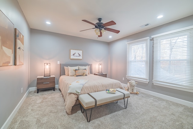 carpeted bedroom featuring ceiling fan